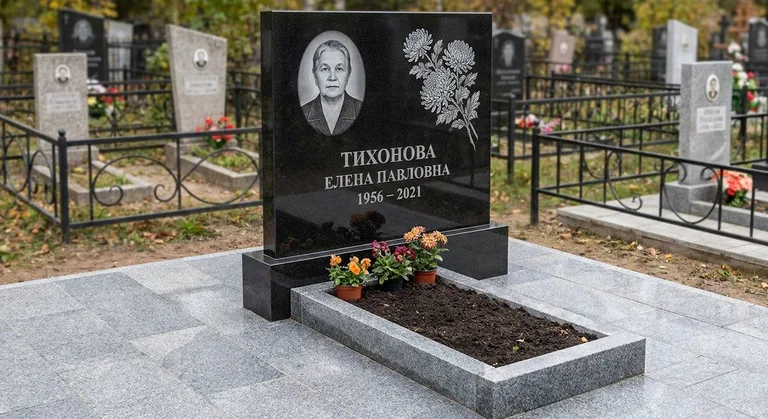 Памятник с гравировкой хризантем — выполненная работа «Тихонова» в Якутске
