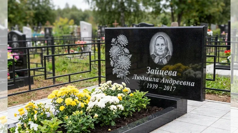 Памятник с гравировкой хризантем — выполненная работа «Зайцева» в Якутске