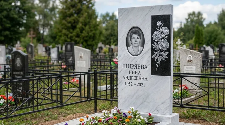 Памятник с гравировкой пионов — выполненная работа «Ширяева» в Якутске