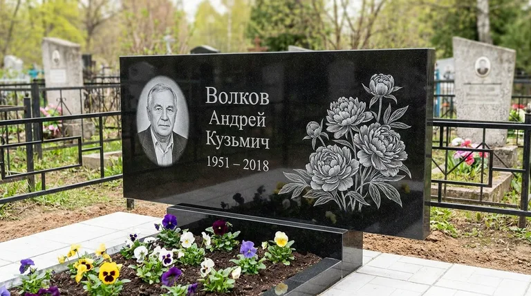 Памятник с гравировкой пионов — выполненная работа «Волков» в Якутске