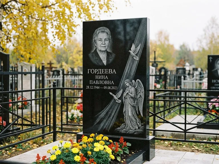 Памятник с гравировкой ангела — гравировка ангела с голубем по диагонали стелы, работа «Гордеева» в Якутске