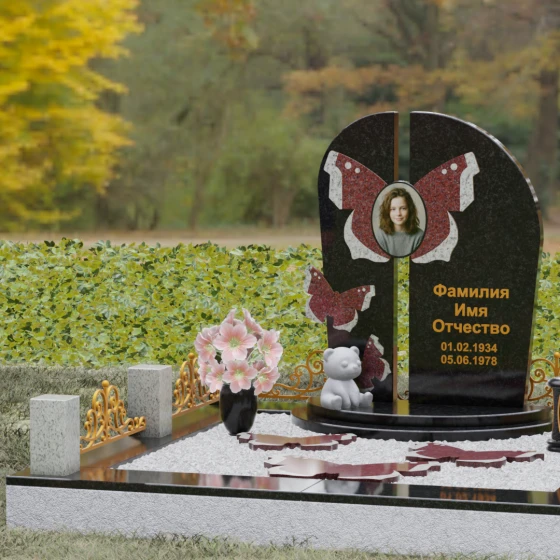 Мемориал с вертикальной стелой и крыльями бабочки, гранит Габбро-диабаз
