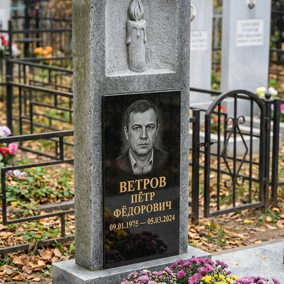Памятник со свечой из мансуровского гранита с арочной нишей
